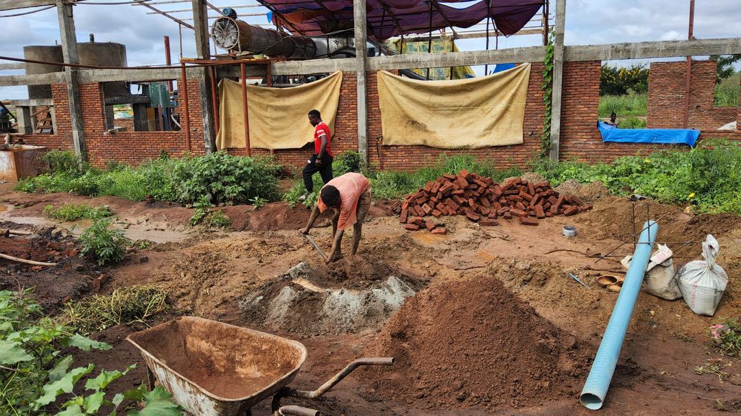 Construction workers reviewing plans